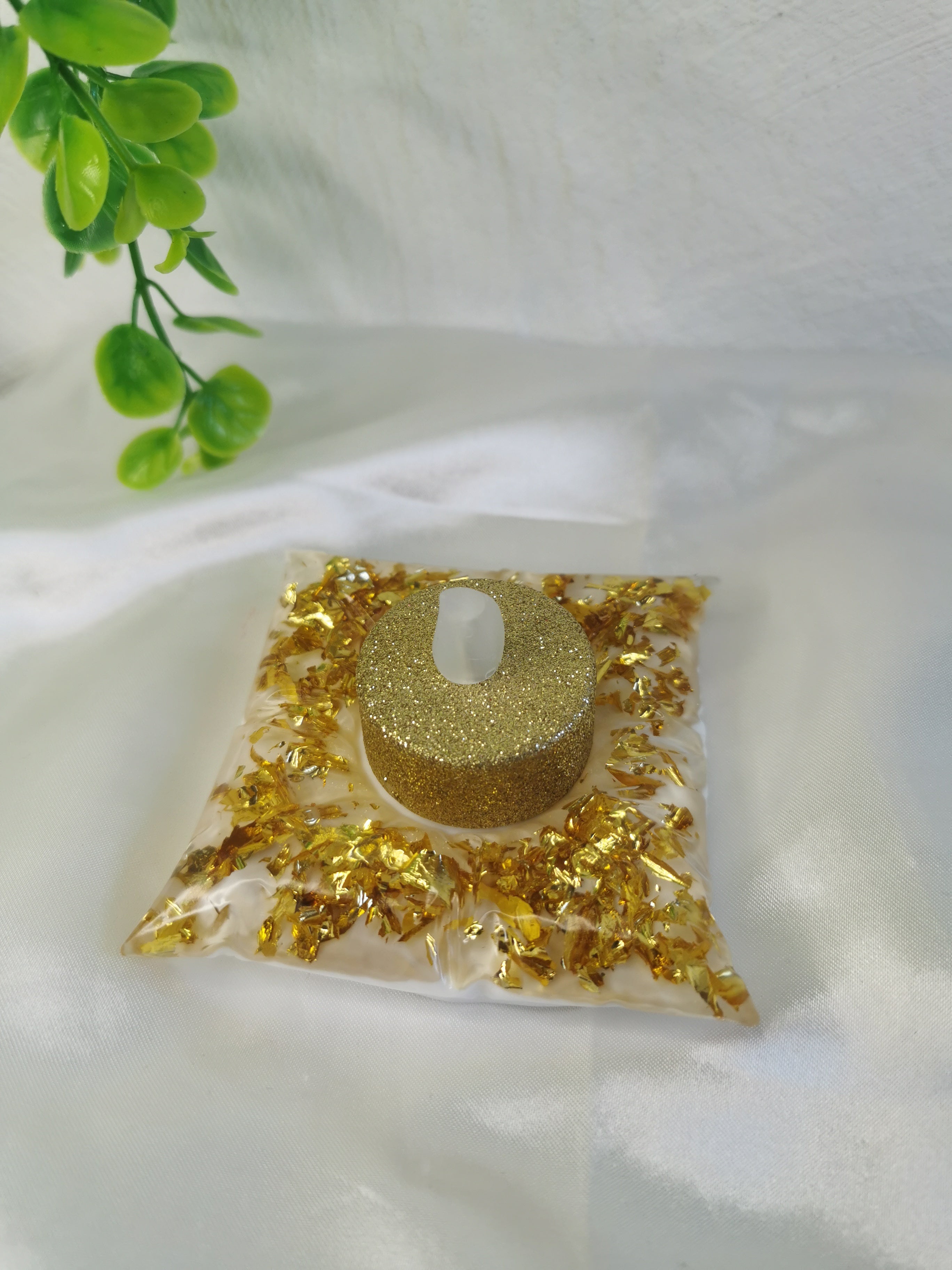 Bougeoir coussin blanc et or
