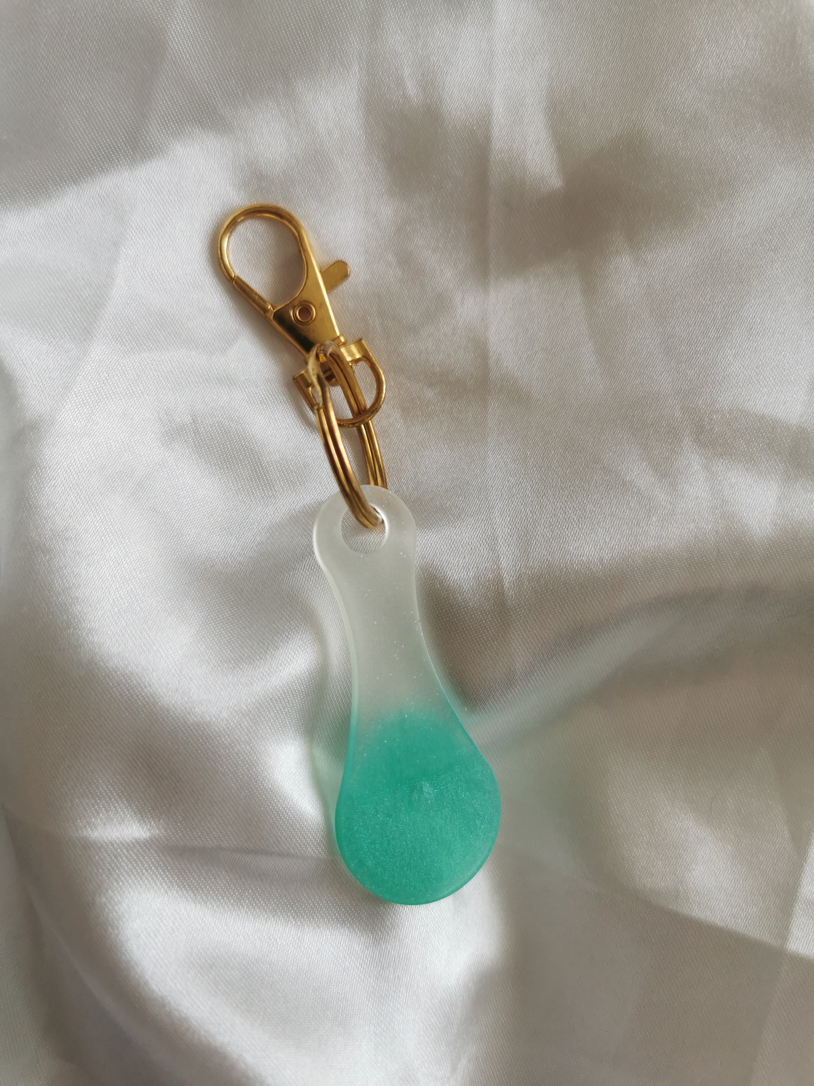 Jeton de caddie blanc et turquoise