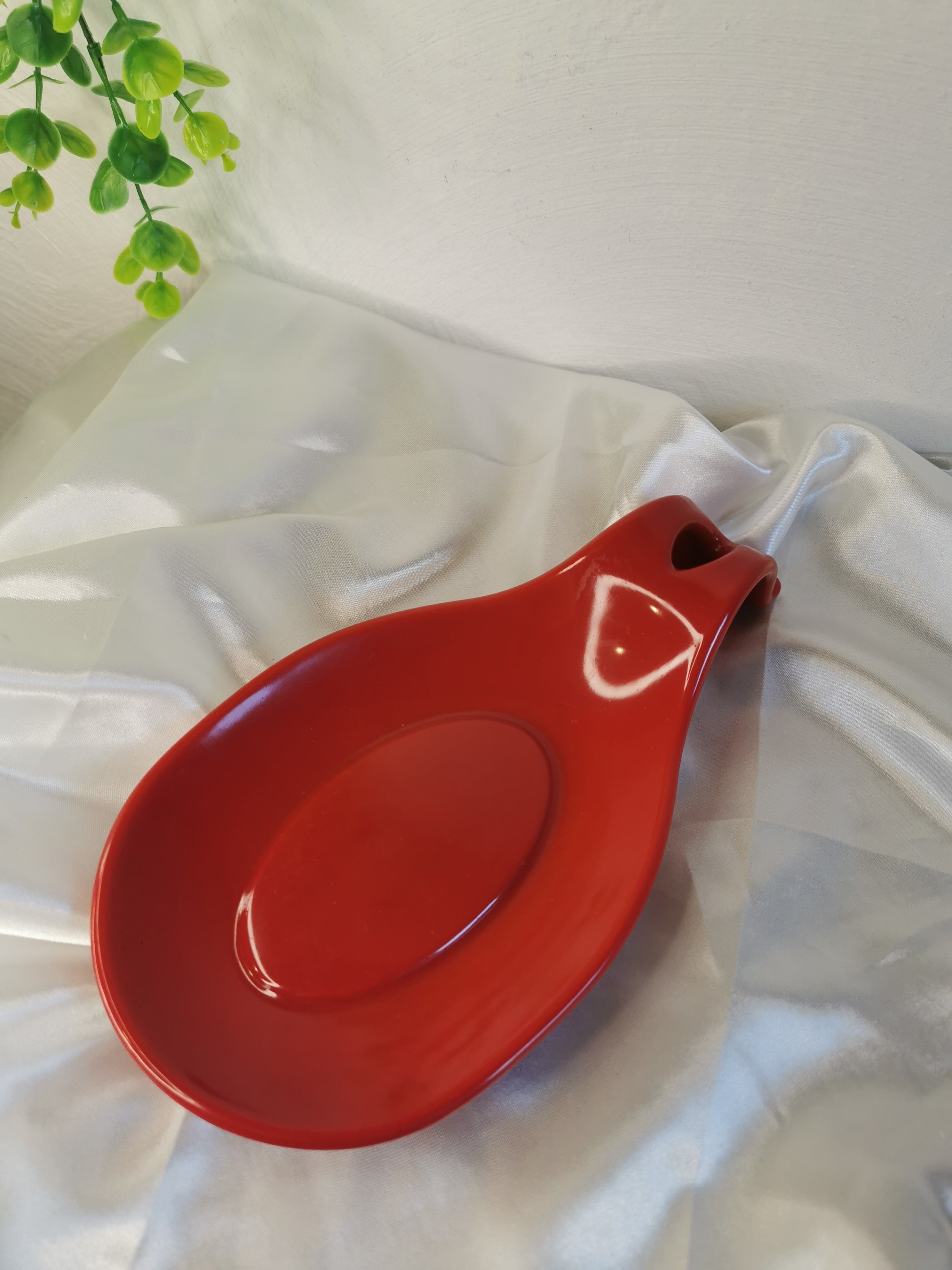 Repose cuillère rouge