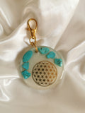Porte clefs pierres de Turquoise et fleur de vie