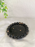 Vide poche Perla rond noir et rose gold